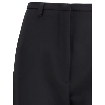 Close-up of The Latest Black Polyester Skinny Pants high-waisted design with zippered closure, highlighting the modern slit detail.