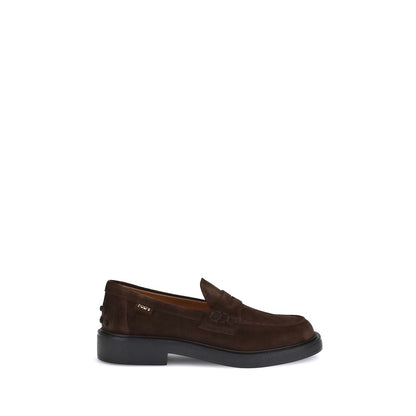 Alt Tag: Tod's Brown Rubber Slip-On Loafers with hand-stitched detailing and rubber pebble heel, showcasing timeless elegance and style.