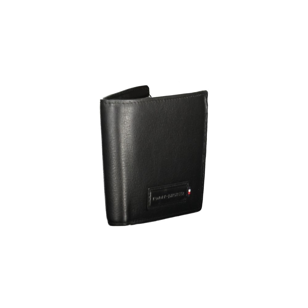 Tommy Hilfiger Black Leather Men Wallet with dual compartments and coin purse for secure storage, modern and sleek design.