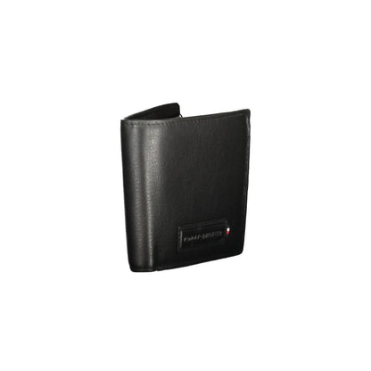 Tommy Hilfiger Black Leather Men Wallet with dual compartments and coin purse for secure storage, modern and sleek design.