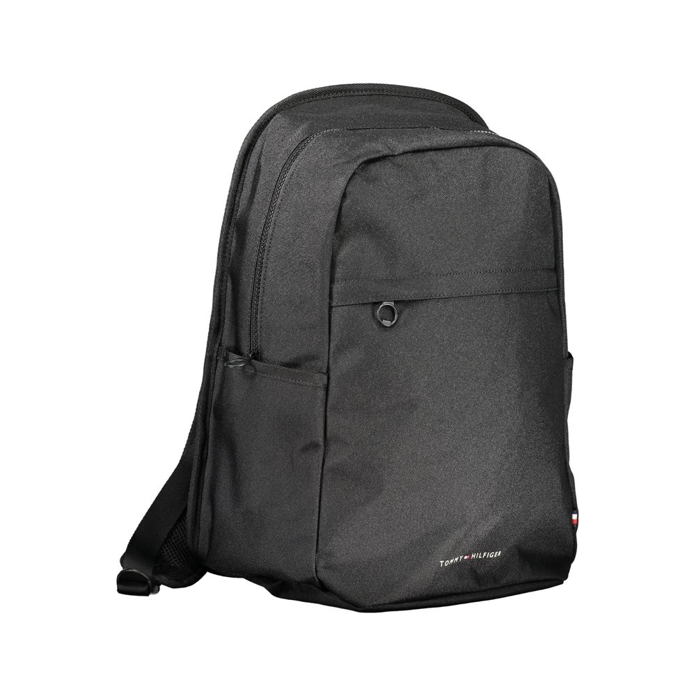 Tommy Hilfiger Black Polyester Backpack with adjustable straps, zip closure, and multiple pockets for convenience.