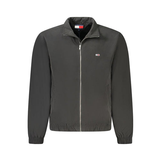 Tommy Hilfiger Black Polyester Men Jacket with logo, long sleeves, and zip closure, showcasing sleek urban style.