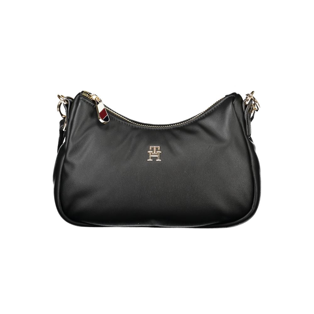 Front view with bag zipped and handles upright.