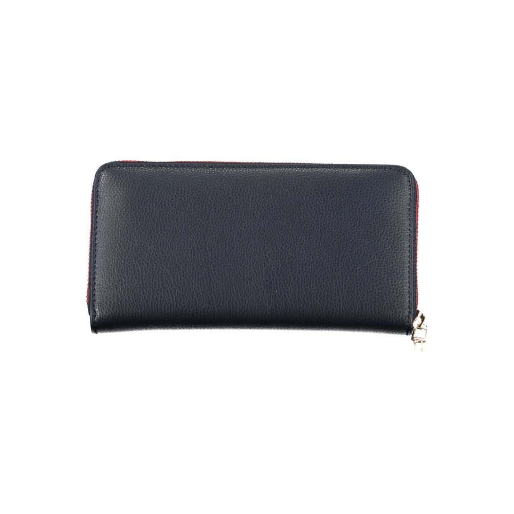 Tommy Hilfiger Elegant Blue Designer Wallet with zip closure, crafted for modern style and functionality.