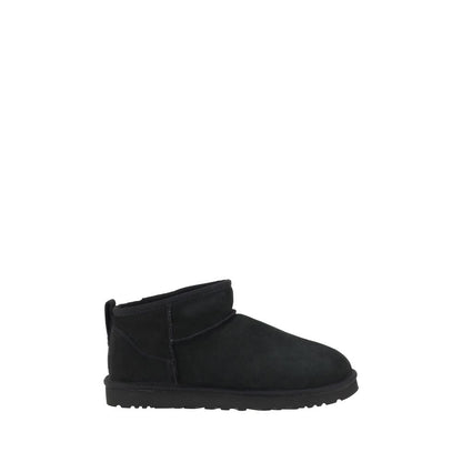 UGG Black Goatskin Ankle Boots with shearling lining and knurled sole for comfort and durability.