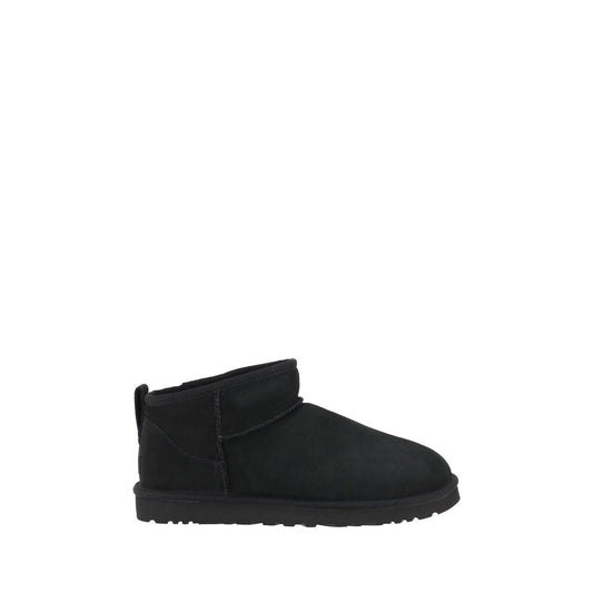UGG Black Goatskin Ankle Boots with shearling lining, round toe, suede design, knurled sole, and iconic monogram on heel.