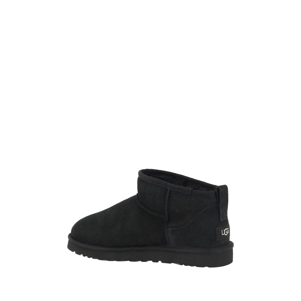 UGG Black Goatskin Ankle Boots with shearling lining and knurled sole for grip, featuring iconic monogram on the heel.