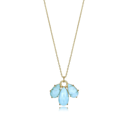 Elegant gold chain necklace with blue gemstones on a minimalist pendant.