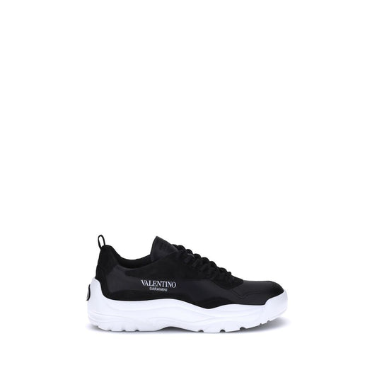 Valentino Garavani Black Calf Leather Bos Taurus Chunky Sneakers with printed logo and VLogo Signature applique on white sole.
