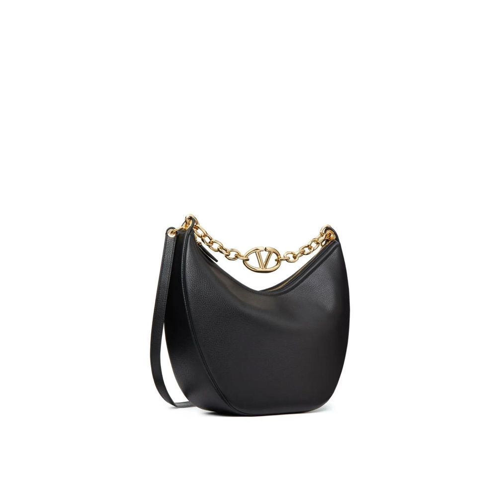 Valentino Garavani Black Calfskin Shoulder Bag with gold-tone Vlogo, leather lining, chain handle, and removable strap.