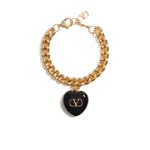 Valentino Garavani Coeur Royal Bracelet with black heart charm, logo engraving, and chunky chain design.