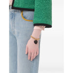 Valentino Garavani Coeur Royal Bracelet with black heart charm and chunky chain design on wrist