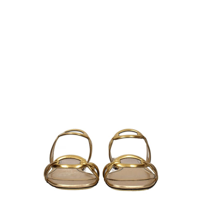 Valentino Garavani Gold Leather Slippers, casual flat open-toe design with gold leather for stylish comfort.