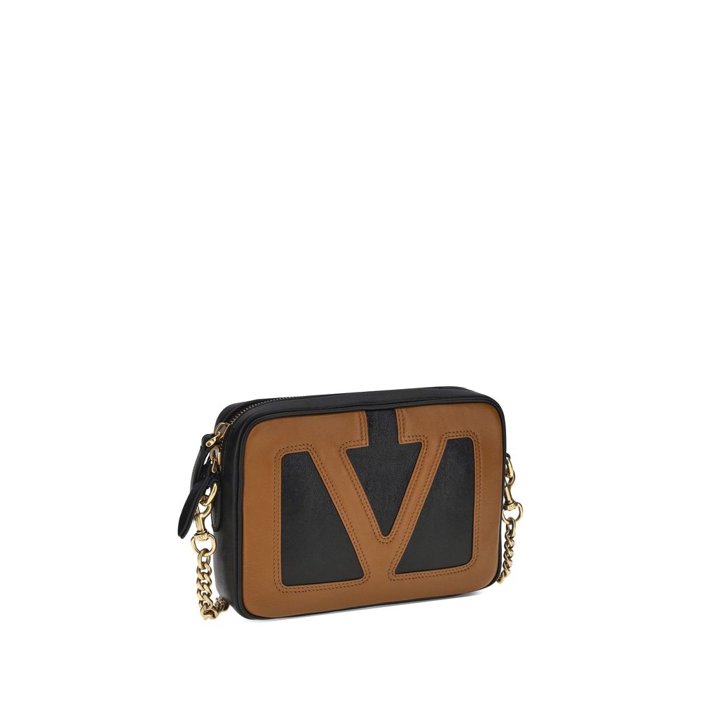 Front view with bag zipped and handles upright.