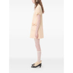 Valentino Short Crepe Couture Dress in beige with bow detail, crew neck, rear zip. Wool and silk composition for elegant style.