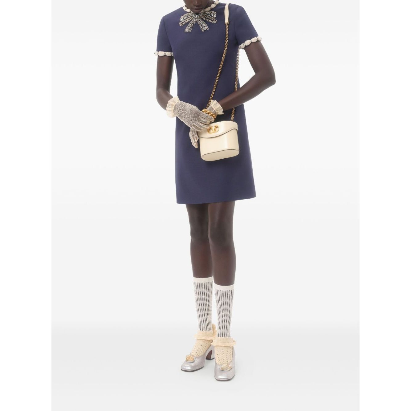 Valentino Short Embroidered Crepe Couture Dress in navy blue with rhinestone embellishments, modeled with gloves and handbag.
