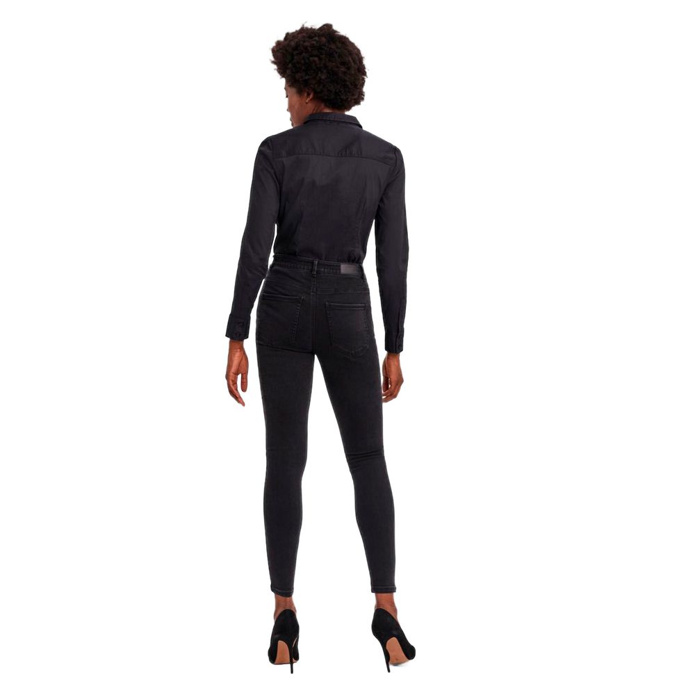 Back view of model wearing Vero Moda Black Cotton Bodysuit paired with dark jeans and high heels