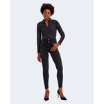 Woman wearing Vero Moda Black Cotton Bodysuit and black high-waisted jeans
