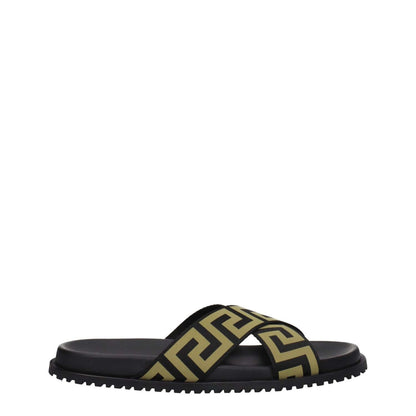 Versace Black Fabric Slippers with gold geometric pattern, open toe, low flat heel, and rubber sole.