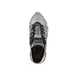 Top view of Versace Trigreca Sneaker featuring fabric, leather details, rubber sole, and lace-up with logo, made in Italy.