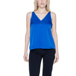 Woman wearing Vila Clothes Blue Polyester Top with V-neck and spaghetti straps.