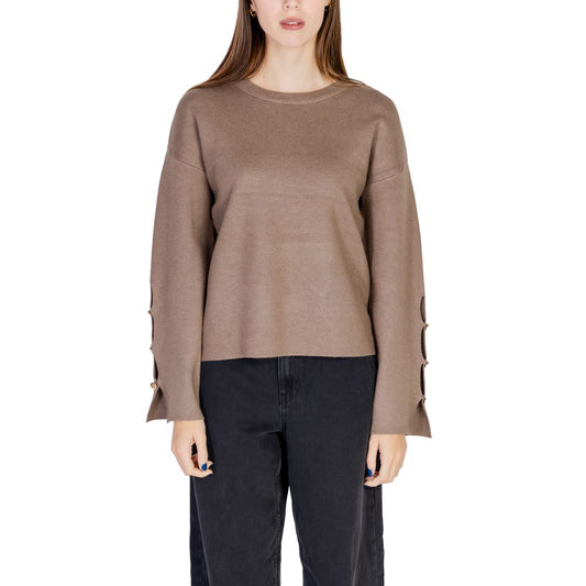 Woman wearing Vila Clothes Brown Viscose Sportswear knit top with button detail sleeves.