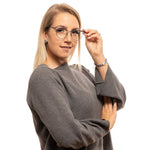 Woman wearing Yohji Yamamoto Green Women Glasses Frame with demo lenses and metal cat eye full-rim style.