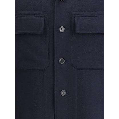 Close-up of ZEGNA Blue Cashmere Coat buttons and pocket details, highlighting fine tailoring and contemporary elegance.